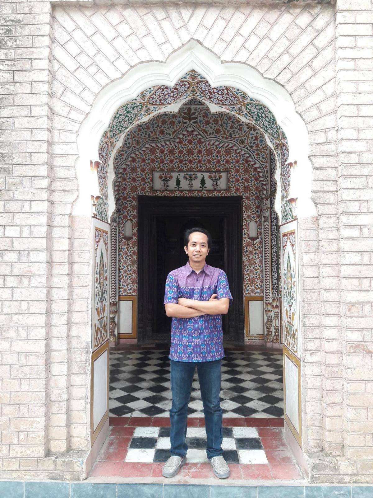 The author at the entrance of a Hindu temple in Saidpur Village, Islamabad
